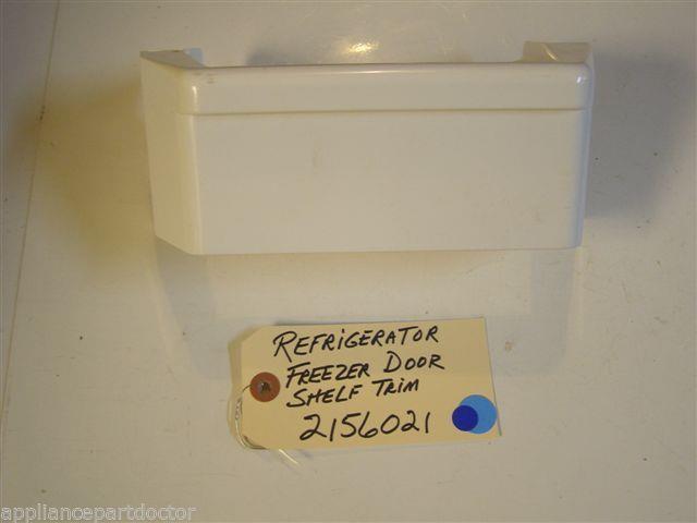 REFRIGERATOR 2156021 FREEZER DOOR SHELF TRIM USED REFRIGERATOR 2156021 FREEZER DOOR SHELF TRIM USED